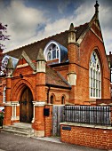 Renovated Neogothic church with brick facade