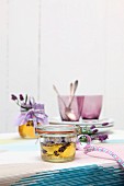 Preserving jar of lavender honey decorated as a gift