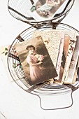 Old letters & photos in vintage wide basket
