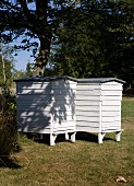 Danish-style wooden beehives in garden