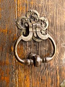Vintage handle on rustic wooden door