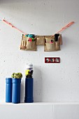 DIY containers made from plastic pipes, work-belt organiser and picture frame made from coloured power outlet panels