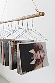 Magazine rack made from suspended and wire coat hangers