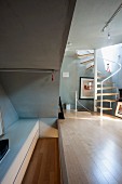 Bedroom and living area with concealed storage space in narrow house in South Korea
