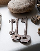 Vintage keys on masonry shelf
