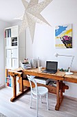 White Thonet chair at old workbench used as vintage-style desk