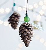 Christmas decorations hand made from pine cones and beads