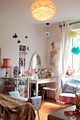 Vintage-style girl's room with dressing table and flamingo-patterned upholstery
