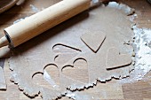 Biscuit dough with cut-out love-hearts