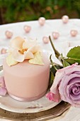 Pink marzipan cake decorated with rose petals