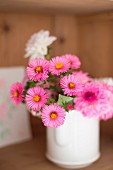 Daisies in white jug
