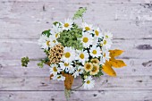 Bouquet with ox-eye daisies and yarrow