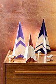 Stylised Christmas trees made from painted plywood