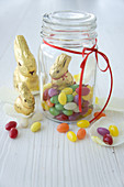 Chocolate bunnies and jar of sugar eggs
