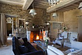 Open fire in comfortable interior of rustic country house