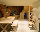 Kitchen in converted church with modern fittings, gallery and Gothic windows