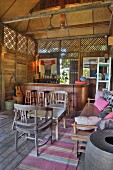 Bar in wood and bamboo cabin with lounge furniture, Langkawi, Malaysia