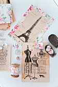 Clippings from vintage French magazines and floral fabric accessories