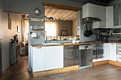 Rustic kitchen with serving hatch