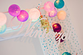 Ball fairy lights and decorative lettering