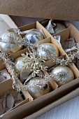 Box of antique Christmas baubles