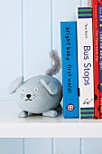 Animal bookend hand-made from pebbles with painted face