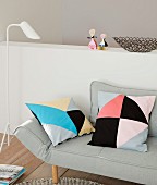 Cushions with homemade tangram-style covers