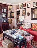 Gallery of pictures and ethnic art in eclectic living room
