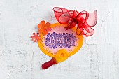 Baby shower decoration:gummy dummy and hand-made sign with 'Baby' motto