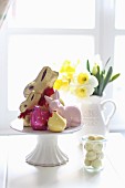 Easter arrangement of bunnies, chicks, narcissus and Easter eggs