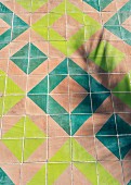 Geometric tiles in shades of blue and green