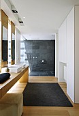 Modern bathroom with open, floor-level shower
