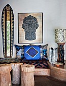 Ethnic living room with masonry bench and patterned cushions