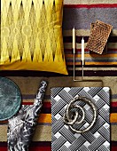Various accessories on striped rug