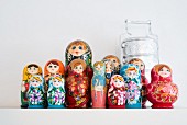 Collection of Russian dolls and tiffin lunchbox
