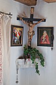 Crucifix and religious icons in traditional Christian domestic shrine