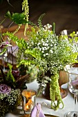 Bouquet with gypsophila on set table