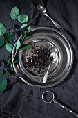 Tea leaves on metal plate