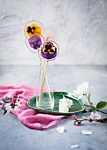 Hand-made flower lollipops with encased violas