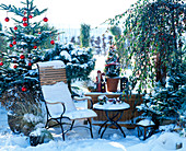 Seating place on the terrace with Christmas decoration