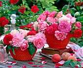 Roses, different roses in red baskets