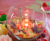 Glass in glass with candle