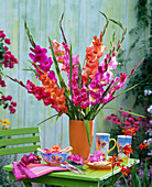 Gladiolus (gladiolus) in orange vase