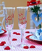 Champagne glasses with writing