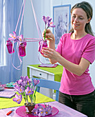 Hanging table top in pink bottles