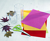 Lanterns with foliage and colorful parchment paper