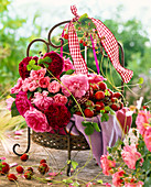 Various pink (rose), Fragaria (wild strawberry)