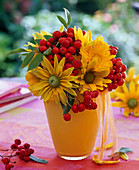 Small bouquet from Rudbeckia, Sorbus