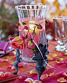 Lantern with feet decorated with pink (rose) and ribbon
