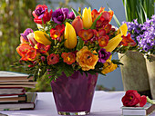 Colorful spring bouquet of freesia (freesia), tulipa (tulip)
